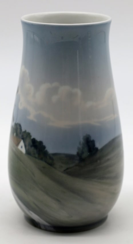Bing & Grondahl Danish Porcelain Landscape Vase with Windmill: Summary Danish porcelain vase by Bing & Grondahl, Copenhagen, decorated in underglaze tones with a panoramic rural landscape. The continuous scene depicts rolling hills beneath a dramatic sky of layer