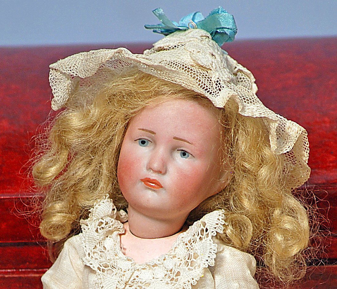 4-A.  TINY KAMMER & REINHARDT BISQUE CHARACTER (1 of 2)