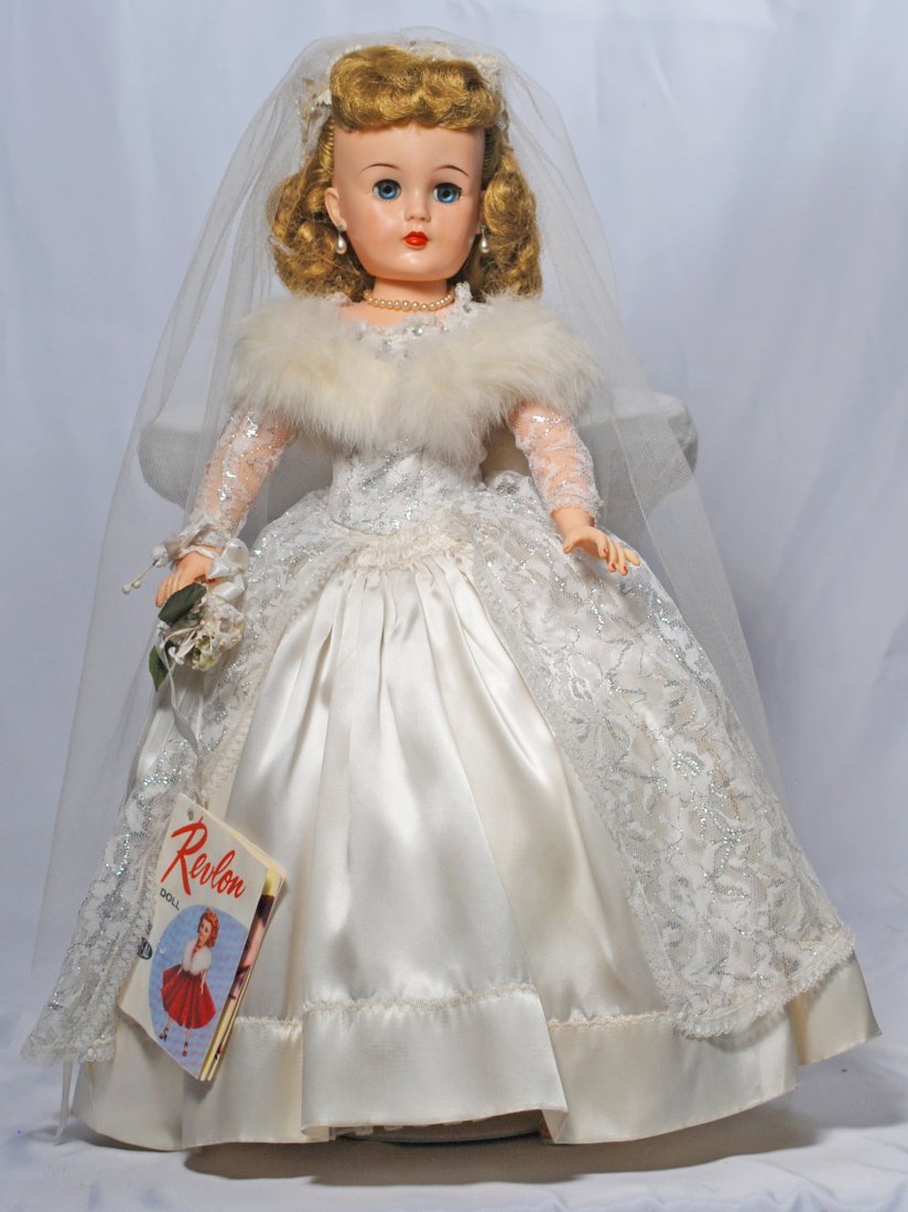40. MISS REVLON BRIDE DOLL BY IDEAL. Marks: Ideal: 40. MISS REVLON BRIDE DOLL BY IDEAL. Marks: Ideal Doll, VT-22. 22". Vinyl socket head, lady body with swivel waist, jointed shoulders and hips, sleep eyes, closed mouth, rooted Saran wig, red lips and