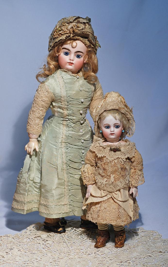 79.  FRENCH BISQUE BEBE F.G. 2 WITH RARE KID BODY AND (1 of 3)