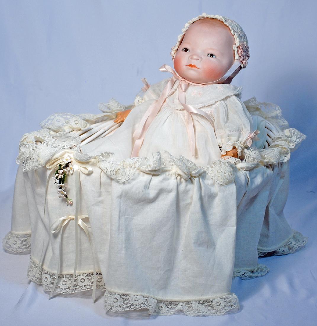 150.  GERMAN BISQUE BROWN-EYED BYE-LO BABY.  Marks: (1 of 2)