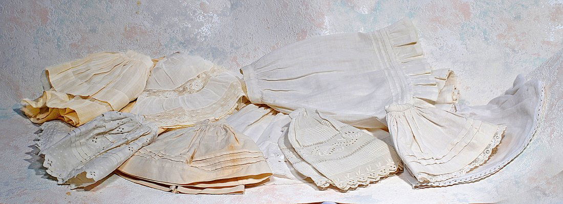 *168.  TEN DOLL PETTICOATS. 6" to 10" length.  Cotton (1 of 1)