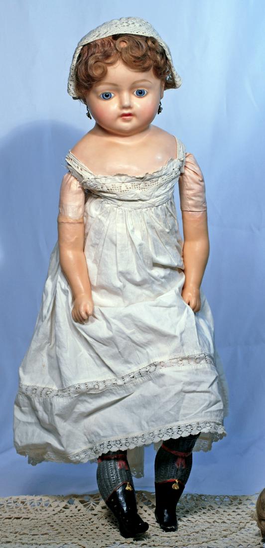243.  LARGE GERMAN WAX-OVER-COMPOSITION DOLL.  28”. (1 of 2)