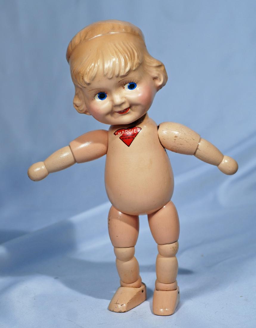 264.  WOOD SEGMENTED CHARACTER “MARGIE”  BY JOS. (1 of 1)