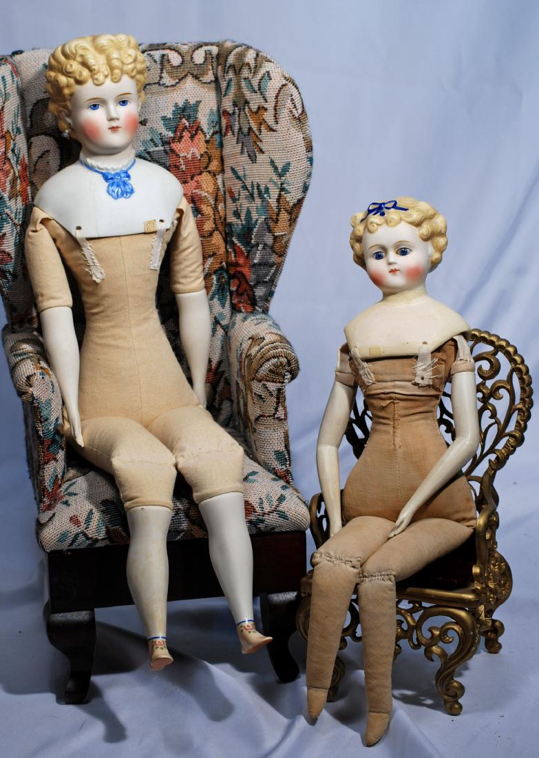 266. TWO PARIAN DOLLS WITH MENDED SHOULDERS.  Each has (1 of 2)