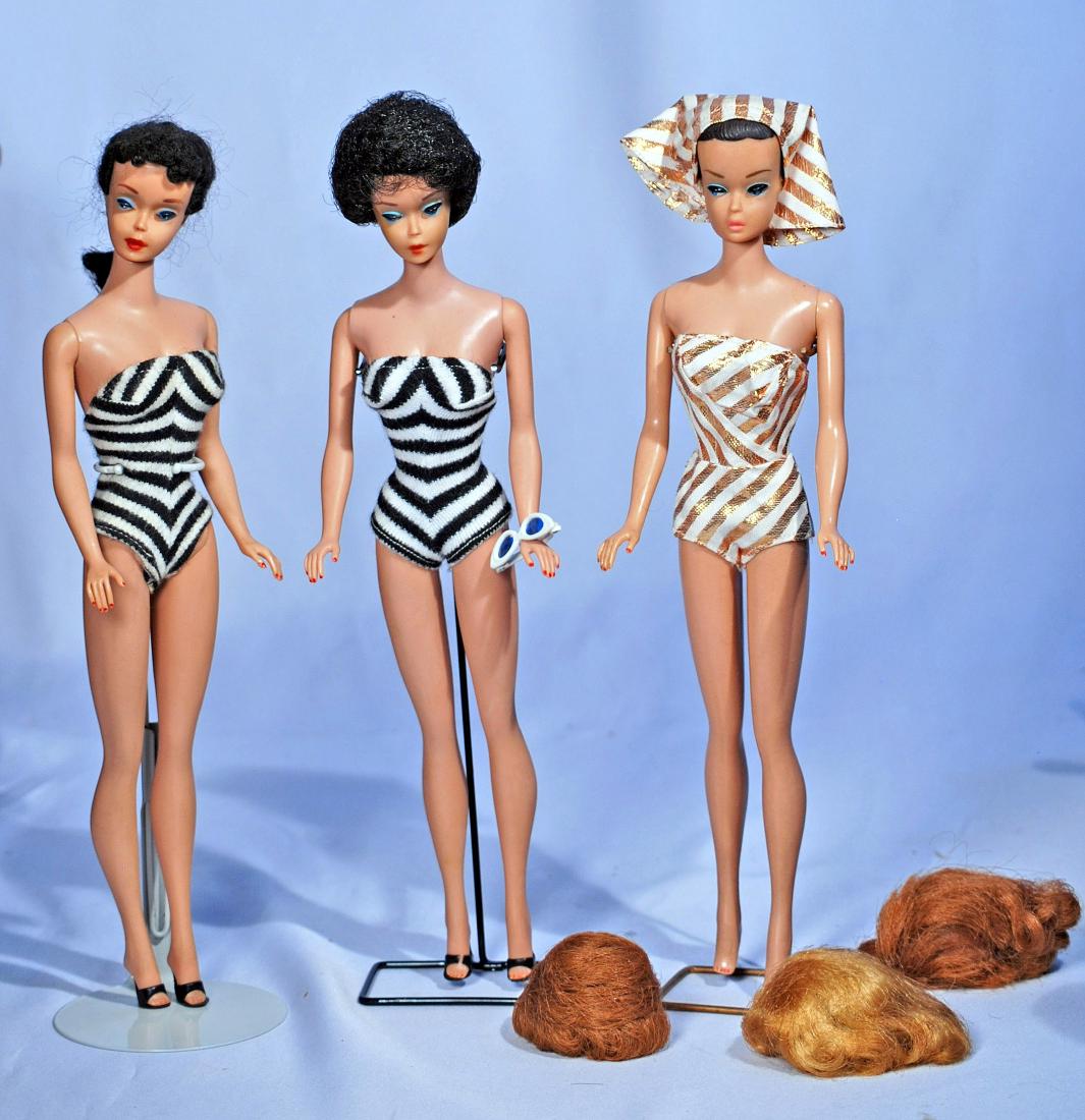 282.  THREE BARBIE DOLLS.  Barbie #4 with black (1 of 1)