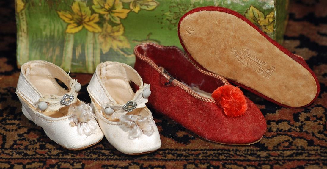 TWO PAIR OF DOLL SHOES.  (1)  2" L. pair of soft white (1 of 1)