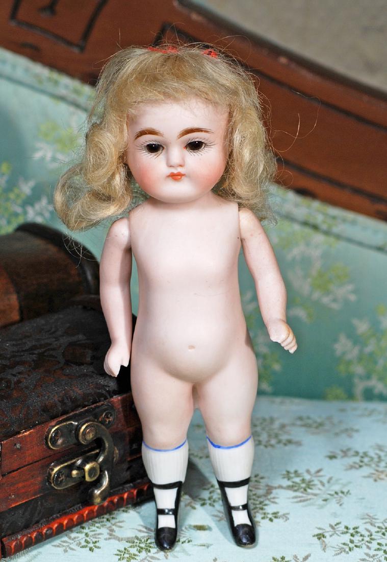 GERMAN ALL BISQUE DOLL WITH TWO-STRAP BOOTINES.  Marks: (1 of 1)