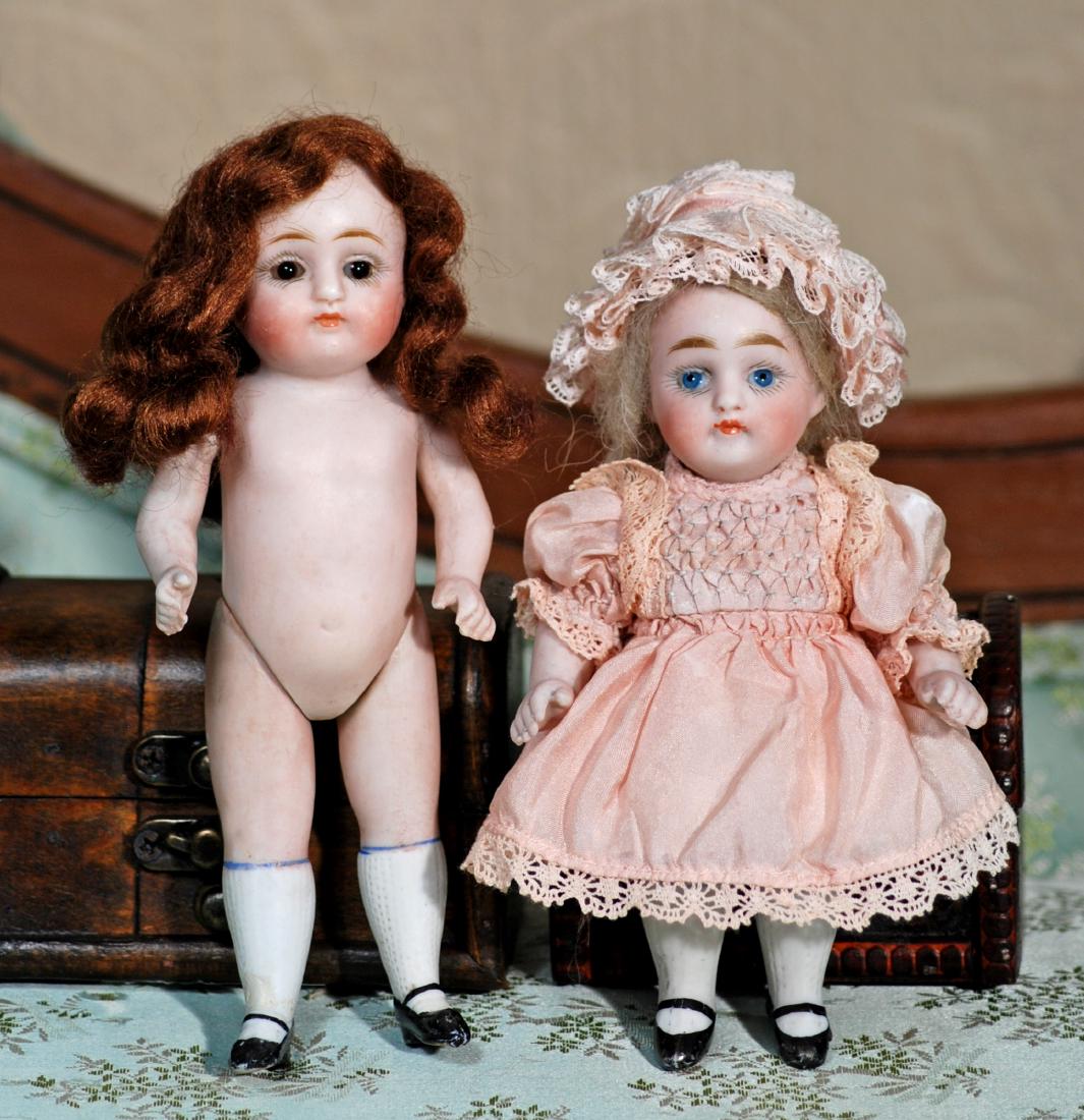 TWO GERMAN ALL-BISQUE DOLLS. 5 ½" doll by Kestner, (1 of 2)