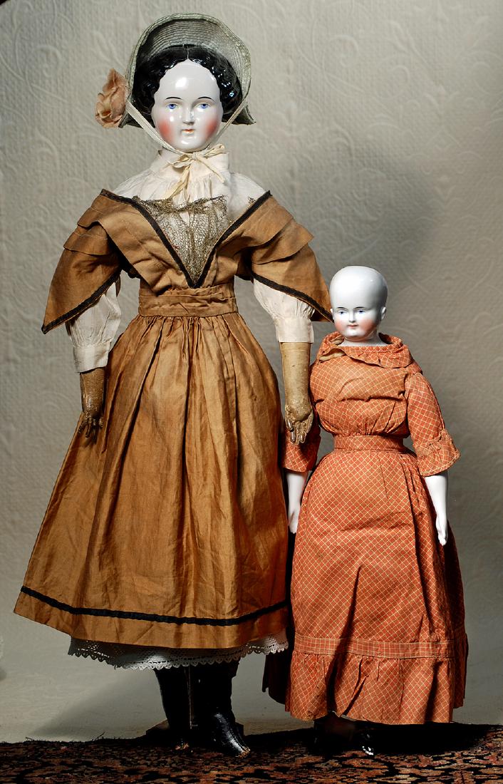 GERMAN PORCELAIN BEIDERMEIER CHINA LADY. 20".: GERMAN PORCELAIN BEIDERMEIER CHINA LADY. 20". Porcelain shoulderhead with painted black pate, painted features, blue eyes, black and pink eyeliner, tapered brows, closed mouth, accented lips, original