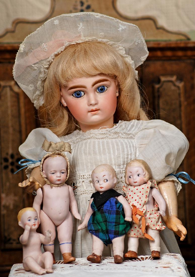 FOUR MINIATURE ALL-BISQUE DOLLS.  2 ½" to 4 ½".  Each (1 of 2)