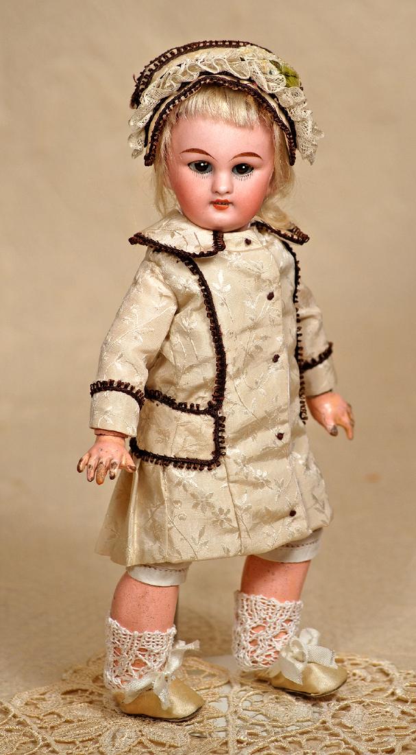 TINY SIMON & HALBIG, 749, BISQUE DOLL FOR THE FRENCH: TINY SIMON & HALBIG, 749, BISQUE DOLL FOR THE FRENCH TRADE. Marks: 749 Dep 3/0 9". Bisque socket head, brown sleep eyes, painted lower lashes, applied upper lashes, tapered brows, slightly parted lips