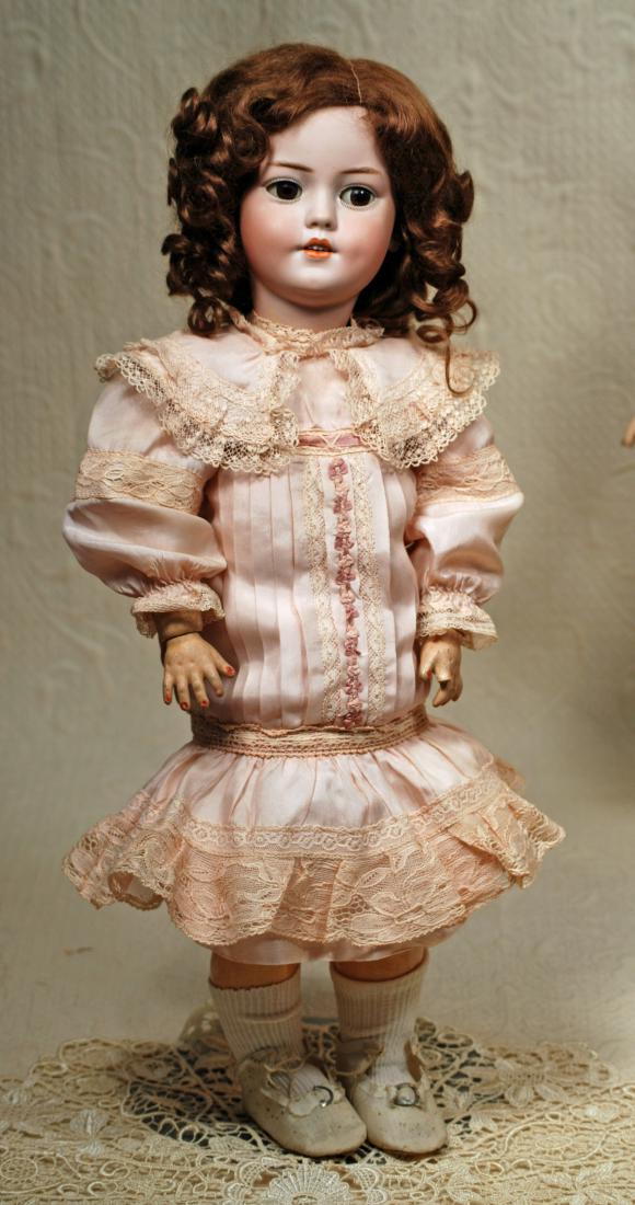 GERMAN BISQUE SIMON & HALBIG 1279 Marks: S H 1279 Dep: GERMAN BISQUE SIMON & HALBIG 1279 Marks: S H 1279 Dep Germany. 19". Bisque socket head, brown sleep eyes, painted lashes, feathered brows, open mouth, accented lips, upper teeth, dimpled cheeks, origi