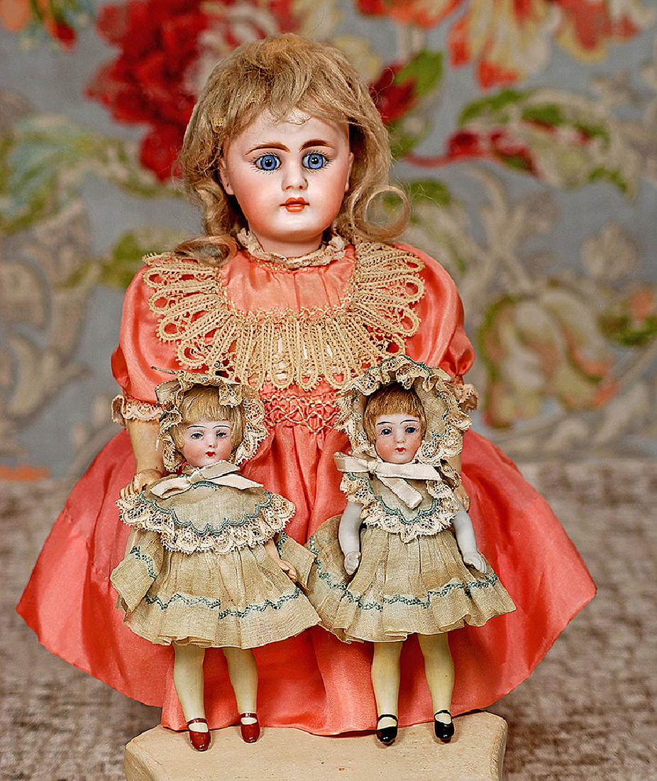 RARE GERMAN ALL-BISQUE FLAPPER TWINS BY BRUNO SCHMIDT: RARE GERMAN ALL-BISQUE FLAPPER TWINS BY BRUNO SCHMIDT Marks: 513 / 13 Each 5 1/2" One-piece bisque head and torso, blue glass sleep eyes, painted lashes, tapered brows, closed mouth, bobbed mohair wig