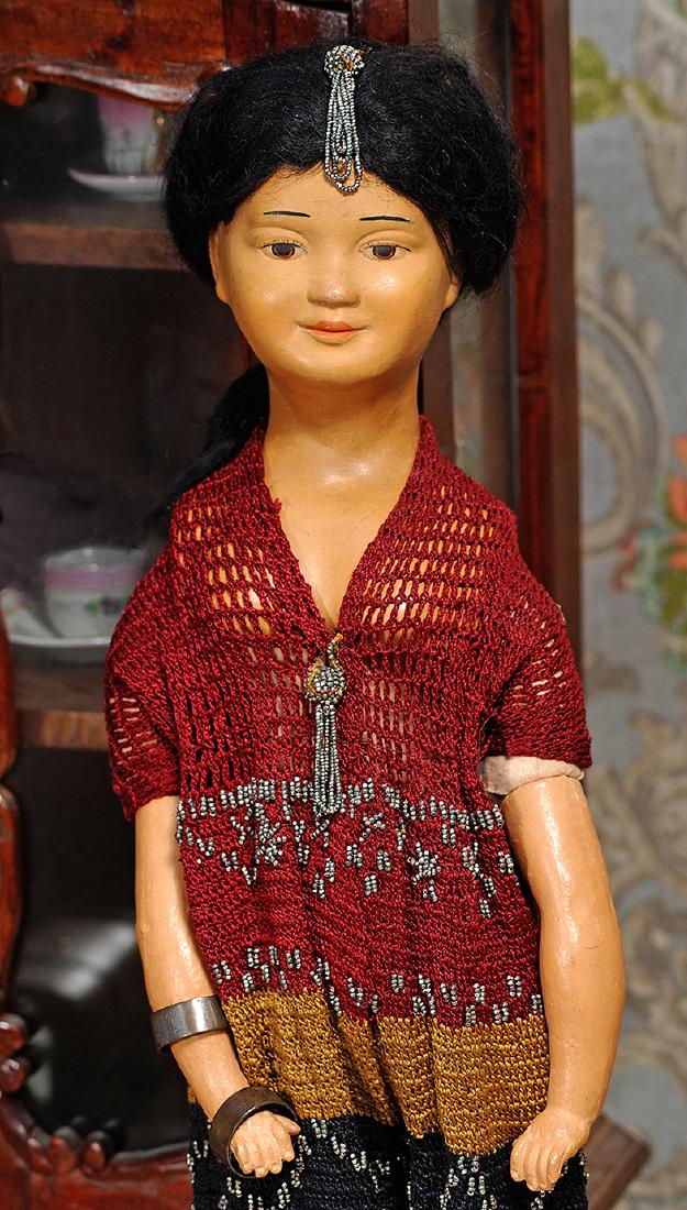 EARTHENWARE PORTRAIT DOLL Marks: 150/2 20" Earthenware: EARTHENWARE PORTRAIT DOLL Marks: 150/2 20" Earthenware shoulderhead with molded bosom, sienna tinted complexion, painted features, brown eyes, upper eyeliner and lashes, tapered brows, closed mouth, s