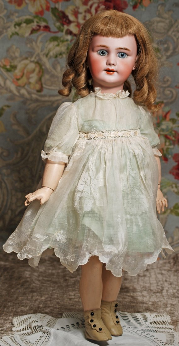 PRETTY FRENCH BISQUE "DEP" BEBE: FRENCH BISQUE “DEP” BEBE. Marks: Dep (incised); Tete Jumeau (red stamp). 23”. Bisque socket head, blue paperweight eyes, painted lashes, feathered brows, pierced ears, open mouth, accented lips,