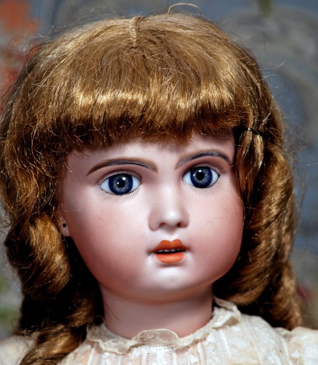 FRENCH BISQUE BEBE 1907 BY JUMEAU.: FRENCH BISQUE BEBE 1907 BY JUMEAU. Marks: 1907 (incised); Tete Jumeau (red stamp). 27 inches. Bisque socket head, blue paperweight eyes, painted lashes, eyeliner, feathered and brushstroked brows, pie