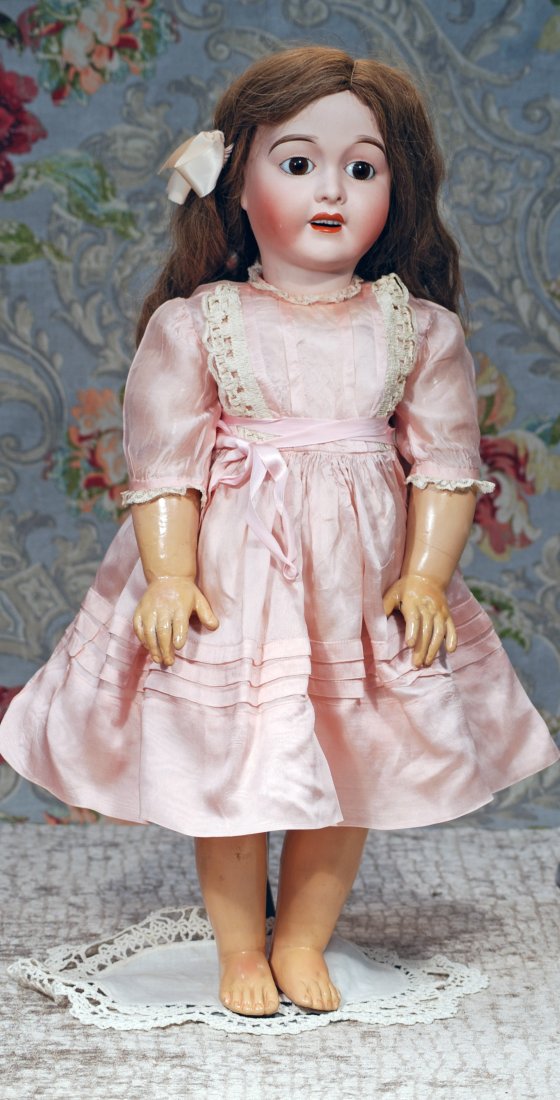 FRENCH BISQUE BEBE “FAVORITE” BY LANTERNIER: FRENCH BISQUE BEBE “FAVORITE” BY LANTERNIER. Marks: Favorite A.L & Cie Limoges. 24”. Bisque socket head, stationary brown glass eyes, painted lashes, feathered brows, open mouth, accented lips, 