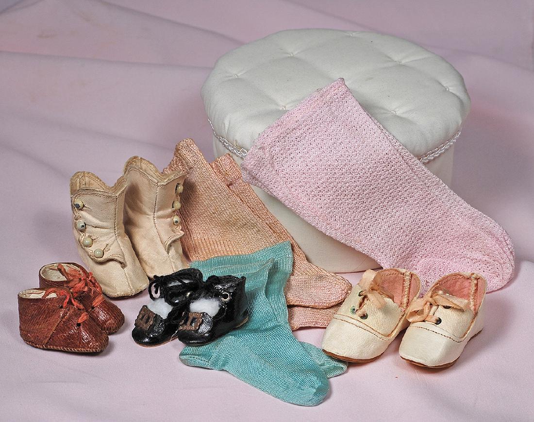 105. GROUP OF DOLL SHOES AND SOCKS. Includes: 2 ¾" pair (1 of 1)