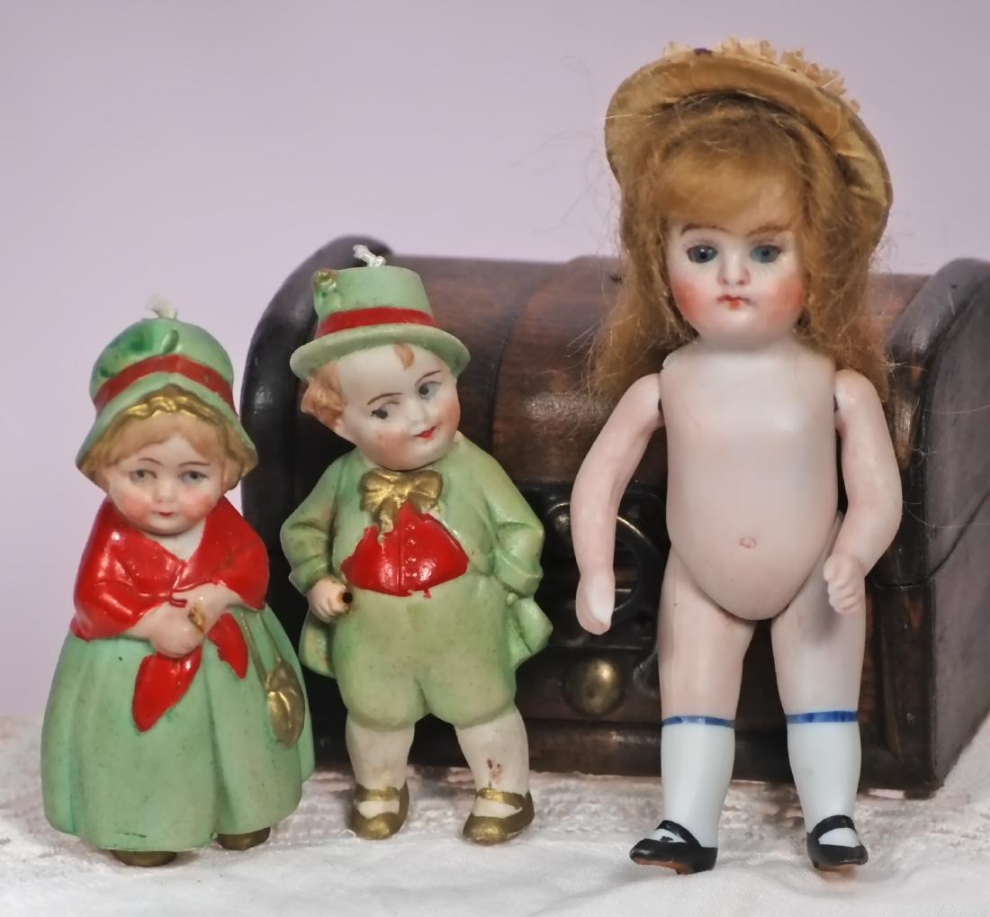 275. GERMAN ALL-BISQUE DOLL & TWO BISQUE NODDERS. 4 ¼" (1 of 1)