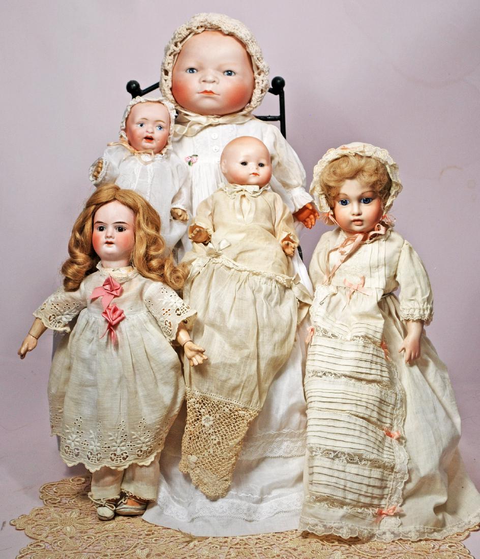 305. FOUR GERMAN BISQUE DOLLS & REPRODUCTION BRU. (1) (1 of 1)