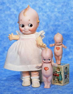 95. RARE, LARGE-SIZE, BISQUE KEWPIE WITH COMPOSITION: 95. RARE, LARGE-SIZE, BISQUE KEWPIE WITH COMPOSITION BODY BY KESTNER. Marks back of head: Ges. Gesch. O'Neill J.D.K.11, Mark on foot: O'Neill. 13";. Bisque socket head with sculpted blonde topknot, fo