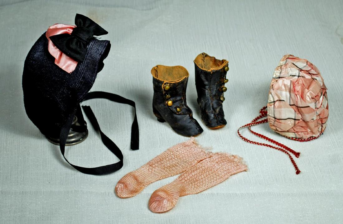 74. DOLL BOOTS, SOCKS, AND TWO BONNETS. Pair of black (1 of 1)