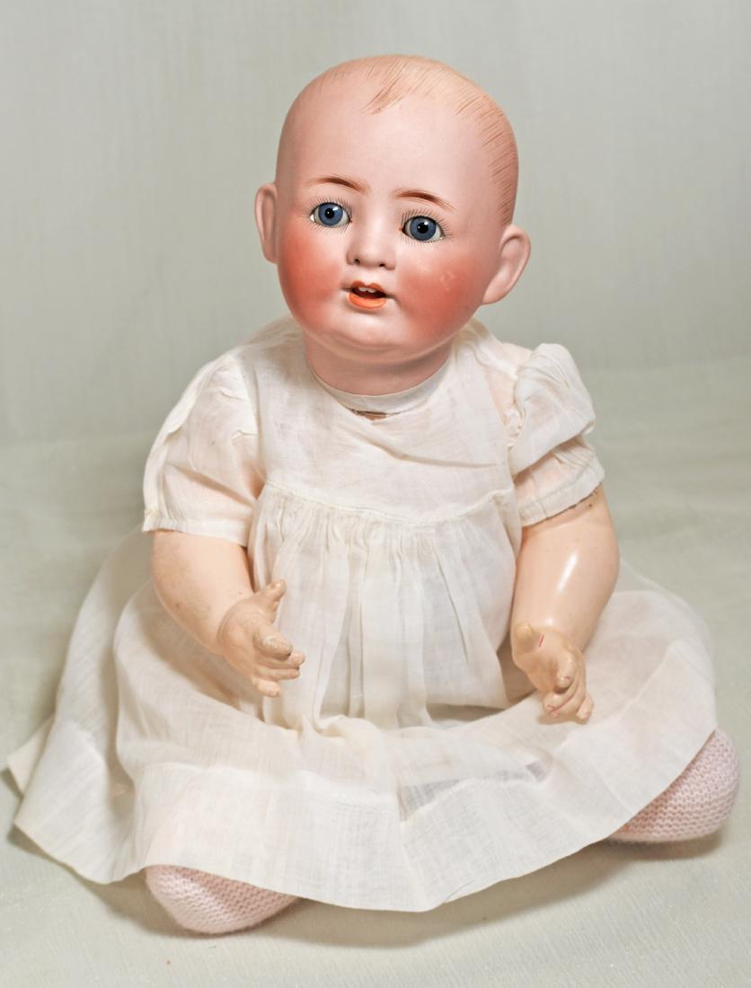 106. GERMAN BISQUE CHARACTER BABY BY FRANZ SCHMIDT.: 106. GERMAN BISQUE CHARACTER BABY BY FRANZ SCHMIDT. Marks: F S & Co. 1255/ 25 Depoinert. 19”. Solid-dome bisque socket head, painted hair, blue sleep eyes, painted lashes, feathered brows, breat