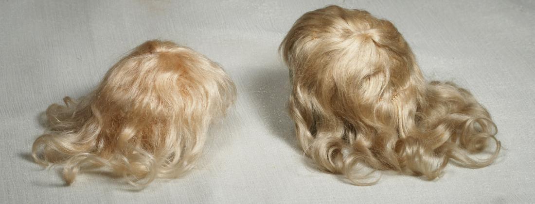 180. TWO BLONDE MOHAIR DOLL WIGS. Each Is soft blonde (1 of 1)