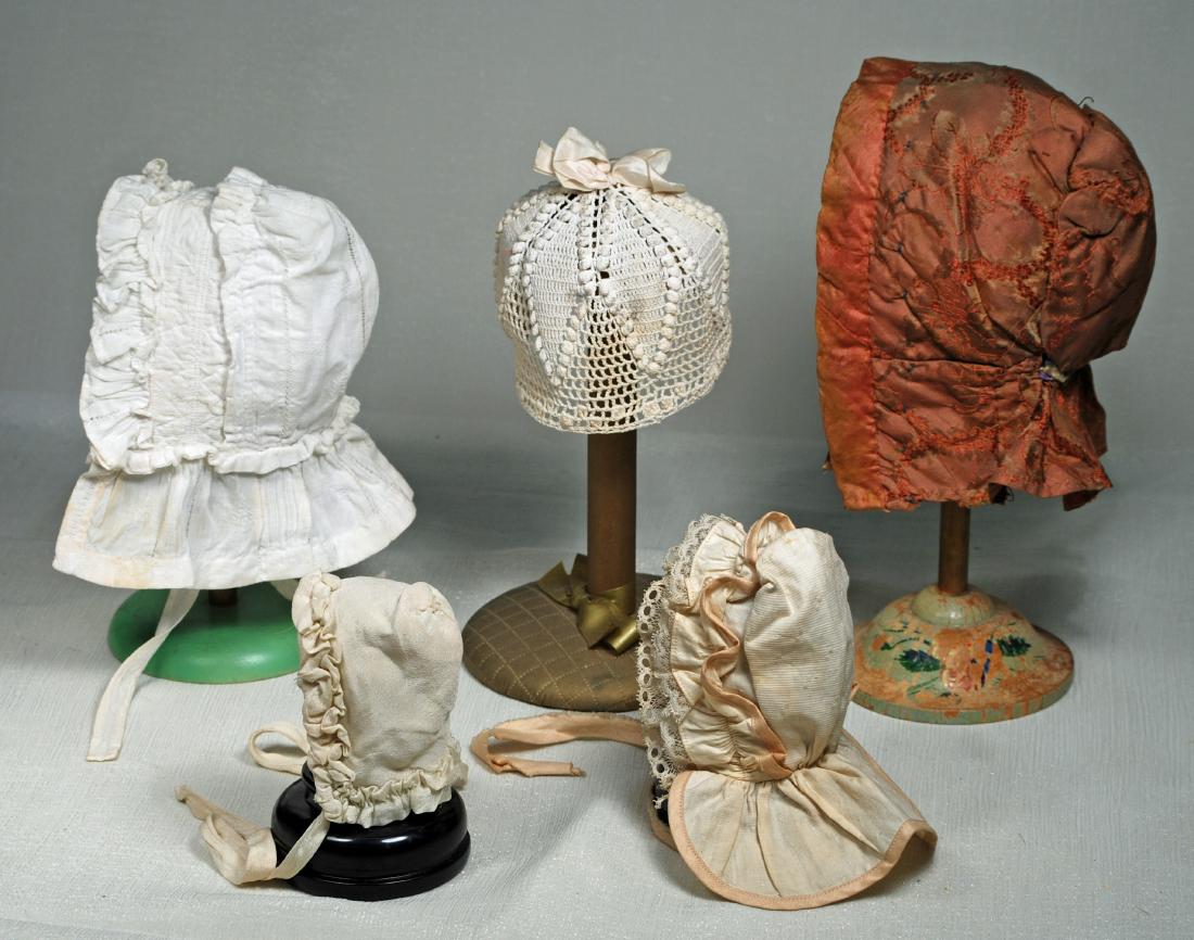 218. FIVE ANTIQUE SILK AND COTTON DOLL BONNETS. Brown (1 of 1)