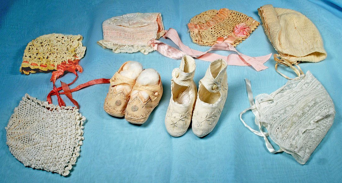 SIX ANTIQUE DOLL BONNETS & TWO PAIR BABY SHOES. (1 of 1)