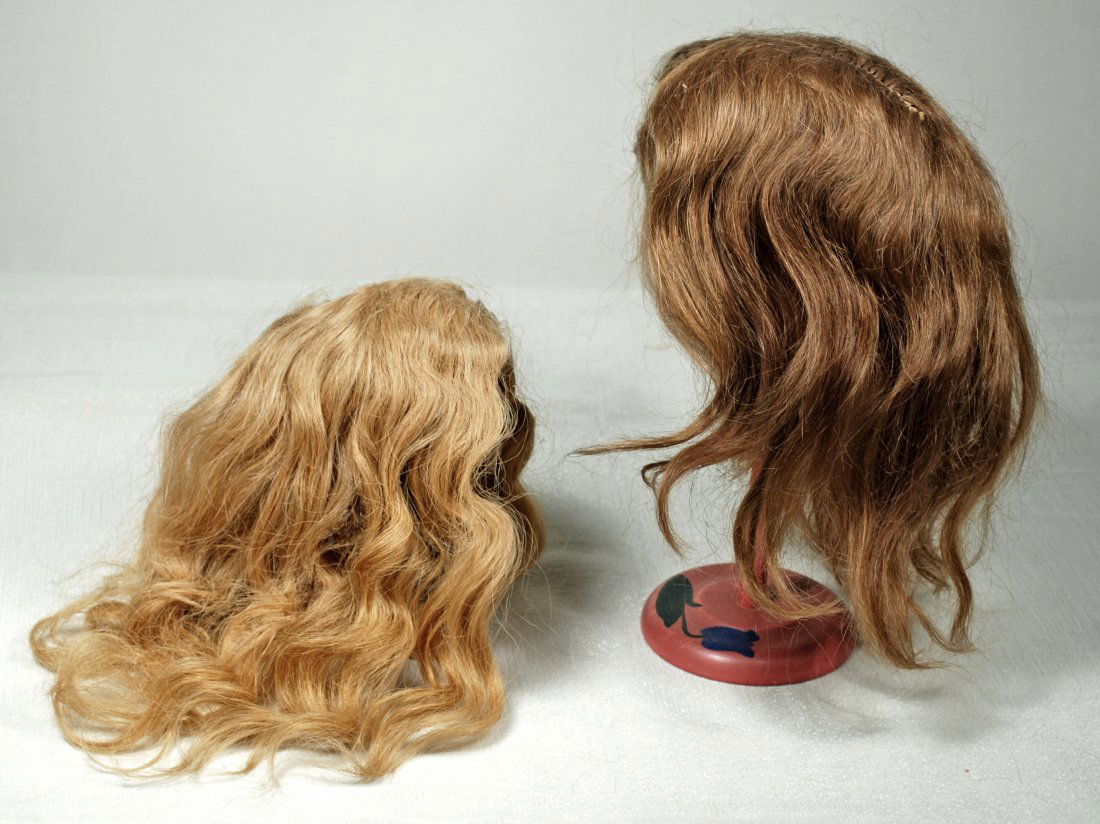 TWO ANTIQUE DOLL WIGS (1 of 1)