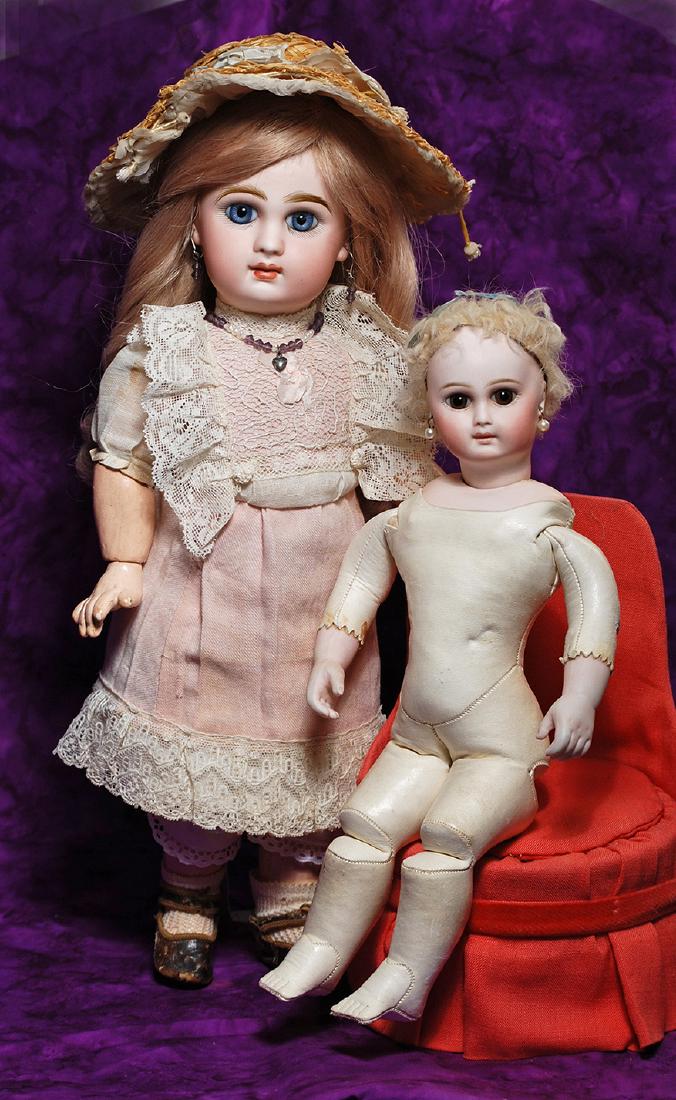 50. BEAUTIFUL BLUE-EYED FRENCH BISQUE JUMEAU BEBE.: 50. BEAUTIFUL BLUE-EYED FRENCH BISQUE JUMEAU BEBE. Marks: Depose Tete Jumeau Bte SGDG 6. 15”. Bisque socket head, large blue paperweight eyes, painted lashes, eyeliner, feathered and brushstroke
