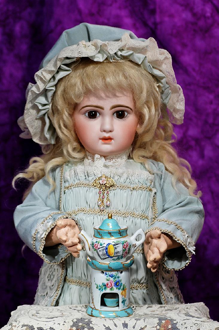 55. LOVELY FRENCH BISQUE BEBE BY JUMEAU. Marks: 12: 55. LOVELY FRENCH BISQUE BEBE BY JUMEAU. Marks: 12 (incised) plus Red artist marks. 26”. Bisque socket head, brown paperweight eyes, eyeliner, rose-blushed eyelids, painted lashes, feathered and