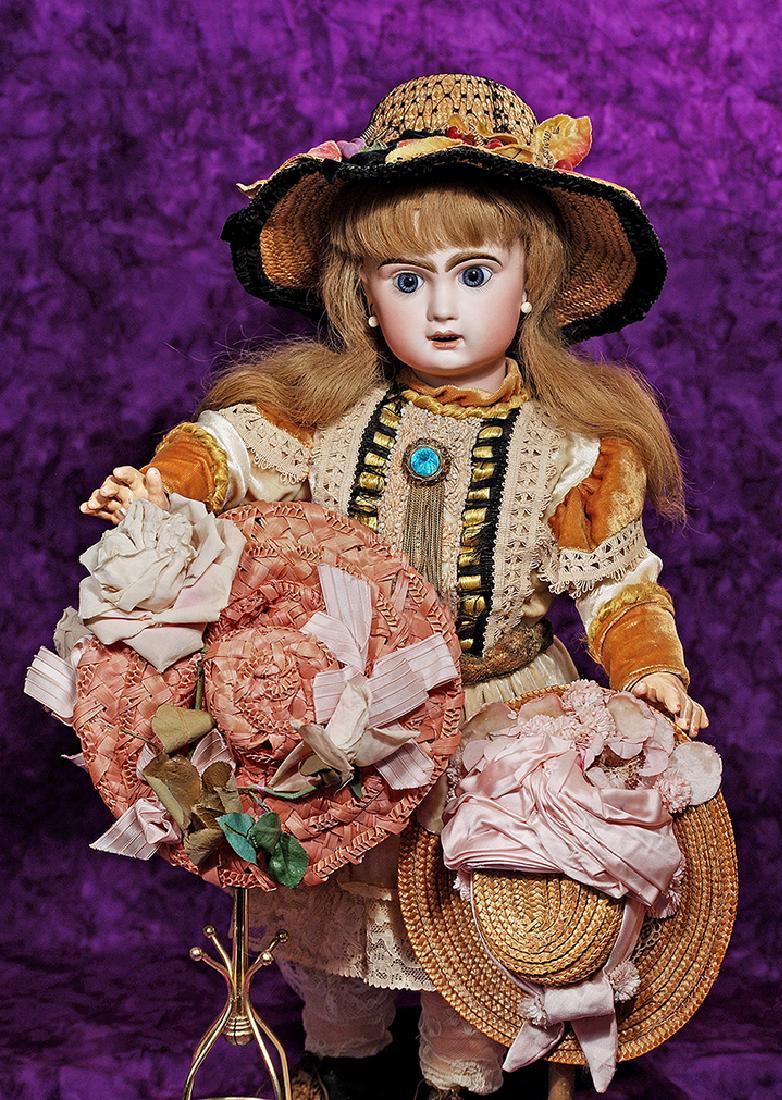 126. FRENCH BISQUE BEBE BY JUMEAU. Marks: Tete Jumeau: 126. FRENCH BISQUE BEBE BY JUMEAU. Marks: Tete Jumeau (red stamp). 22”. Bisque socket head, blue paperweight eyes, painted lashes, feathered and brush-stroked brows, open mouth, shaded and accen