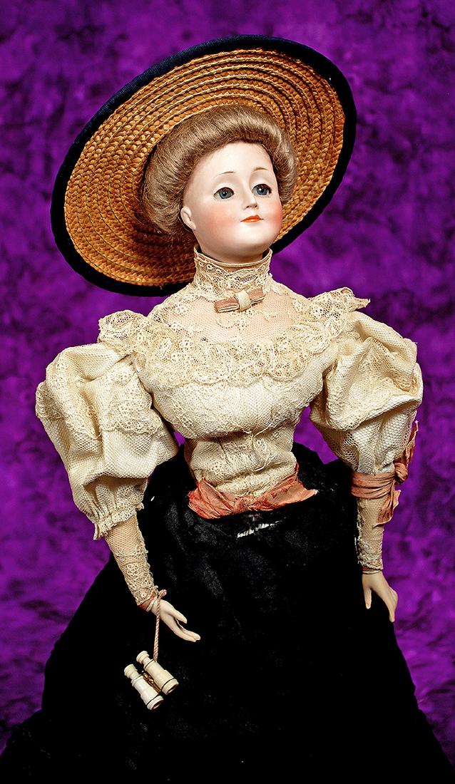 143. GERMAN BISQUE GIBSON GIRL BY KESTNER. Marks: 172,: 143. GERMAN BISQUE GIBSON GIRL BY KESTNER. Marks: 172, made in Germany. 17”. Bisque shoulderhead in uptilted pose, blue sleep eyes, applied upper lashes, painted lower lashes, feathered brows, c