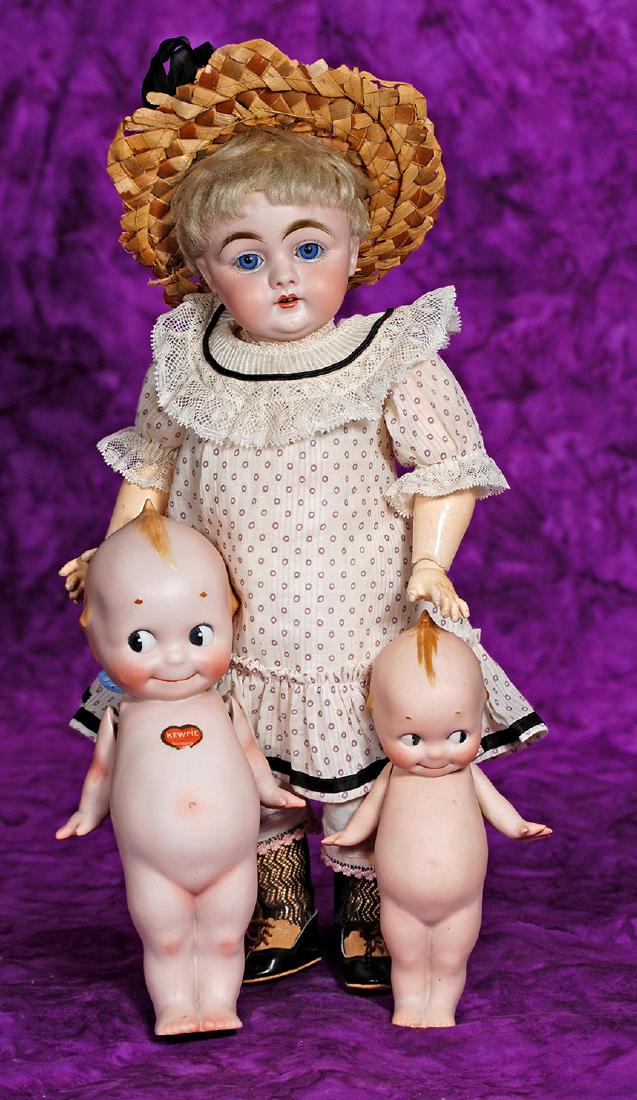 171. GERMAN BISQUE CHARACTER, MOLD 143, BY KESTNER.: 171. GERMAN BISQUE CHARACTER, MOLD 143, BY KESTNER. Marks: C made in Germany 7, 143. 14". Bisque socket head, blue sleep eyes, painted lashes, feathered and brushstroked brows, open mouth, accented li