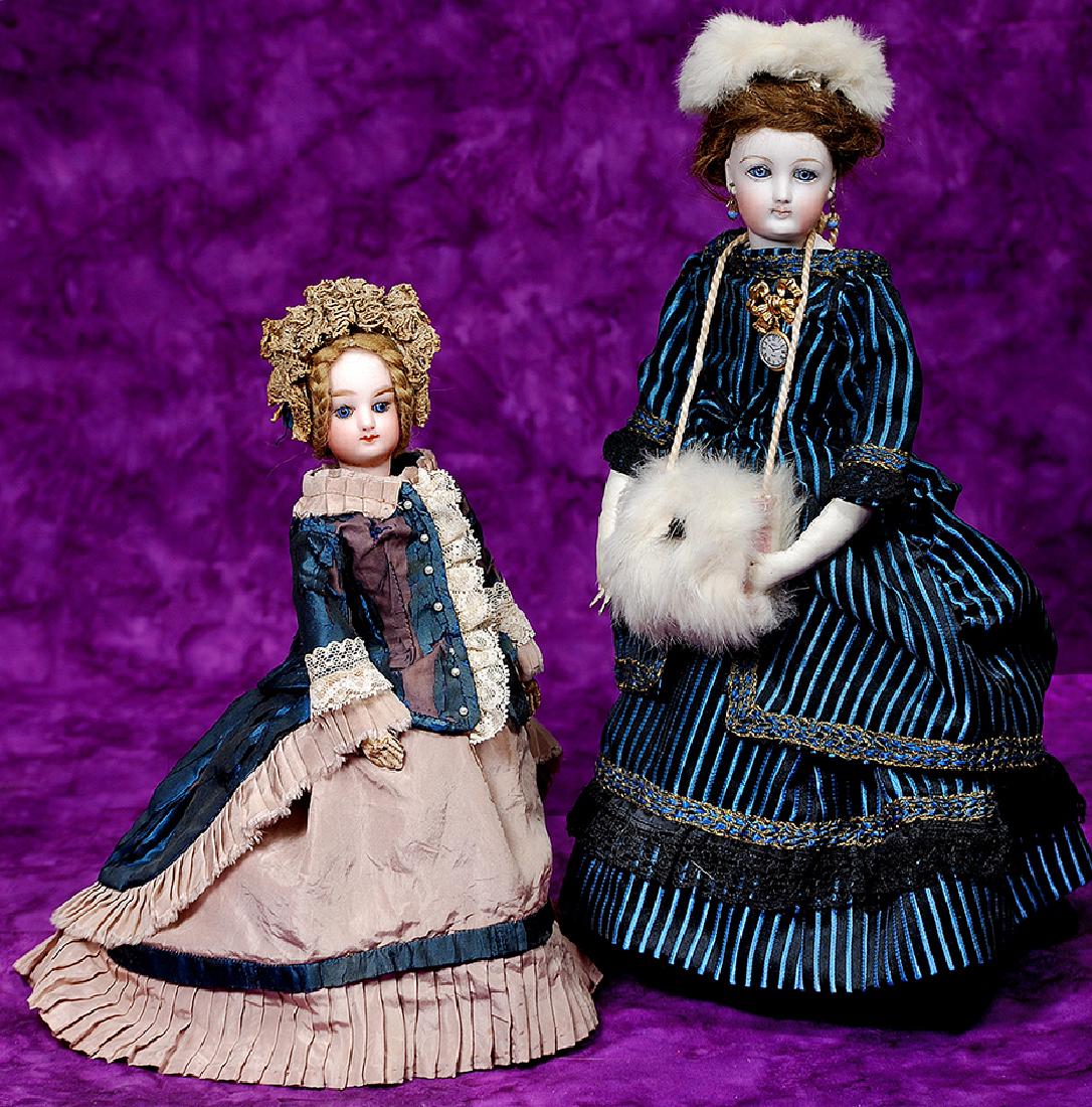197. PETITE FRENCH BISQUE JUMEAU-TYPE POUPEE. Marks: 0.: 197. PETITE FRENCH BISQUE JUMEAU-TYPE POUPEE. Marks: 0. 13". Bisque swivel head, blue paperweight eyes, painted lashes, eye liner, feathered brows, closed mouth, shaded and accented lips, pierced ears