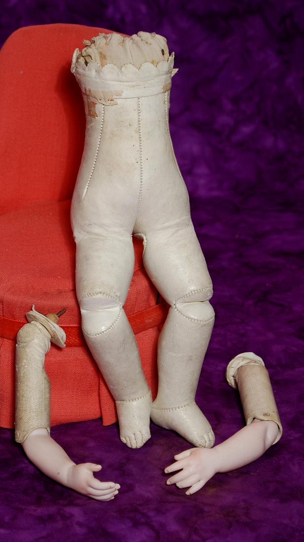 224. ORIGINAL BRU BEBE KID BODY. 10”. Kid body: 224. ORIGINAL BRU BEBE KID BODY. 10”. Kid body with gusset joints at hips and knees, scalloped edge, kid-over-wood upper arms, hinged elbows and bisque forearms. Commentary: Circa 1882, classic 