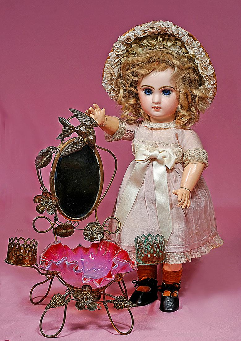 46. FRENCH BISQUE BLUE-EYED BEBE BY JUMEAU. Mark:: 46. FRENCH BISQUE BLUE-EYED BEBE BY JUMEAU. Mark: Tete Jumeau Detpose Bte SGDG 5. 14”. Bisque socket head, large blue paperweight eyes, painted lashes, feathered and brushstroked brows, closed mouth