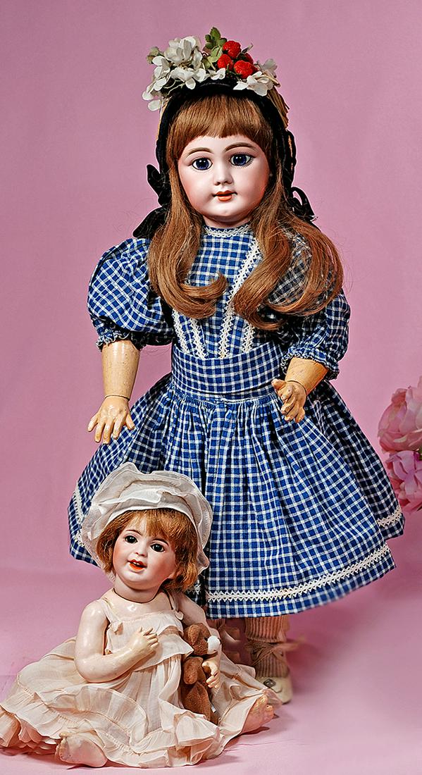 56. FRENCH BISQUE DEP BEBE BY JUMEAU. Marks: DEP 10.: 56. FRENCH BISQUE DEP BEBE BY JUMEAU. Marks: DEP 10. 22”. Bisque socket head, large blue paperweight eyes, eyeliner, painted lashes, feathered and brushstroked brows, open mouth, shaded and accented