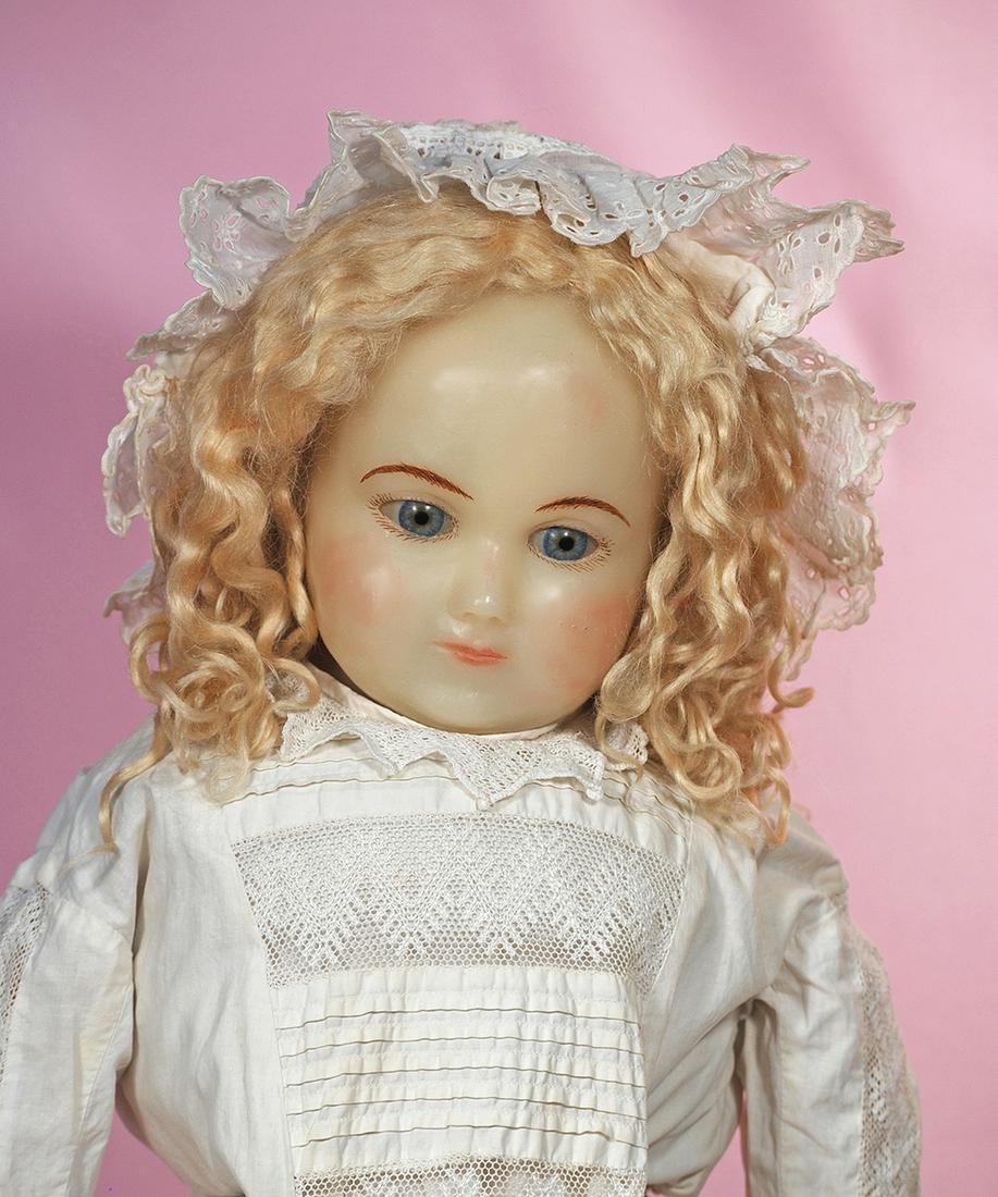140. RARE, LARGE SIZE ENGLISH POURED WAX DOLL WITH: 140. RARE, LARGE SIZE ENGLISH POURED WAX DOLL WITH EXPRESSIVE FACE. 36”. Poured wax shoulderhead, blue glass inset eyes, painted feathered brows, closed mouth, antique blonde mohair wig over solid d