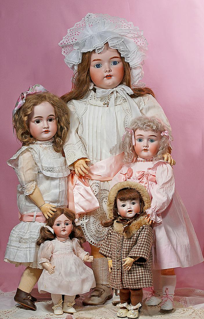 199. GERMAN BISQUE KESTNER CHARACTER, 143, WITH: 199. GERMAN BISQUE KESTNER CHARACTER, 143, WITH TODDLER BODY. Marks: D. made in Germany 8. 13”. Bisque socket head, brown sleep eyes, painted lashes, feathered brows, open mouth, accented lips, two 
