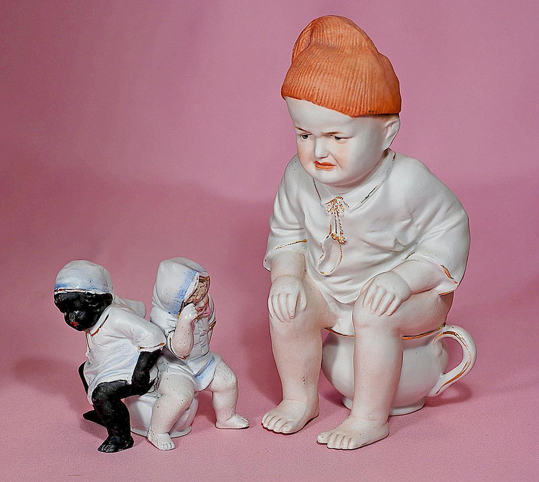 225B. TWO GERMAN PORCELAIN BABIES ON CHAMBER POT. 4” Aug 24, 2019