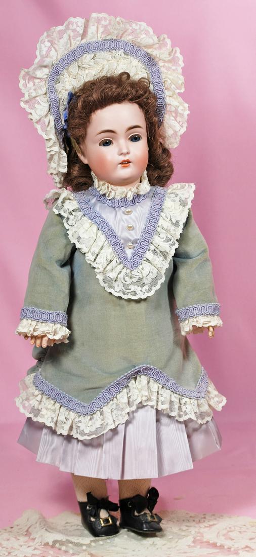 262. GERMAN BISQUE CHILD, 171, BY KESTNER. Marks: D ½: 262. GERMAN BISQUE CHILD, 171, BY KESTNER. Marks: D ½ made in Germany 171, 6 ½. 20”. Bisque socket head, stationary blue glass eyes, painted and applied lashes, feathered brows, open mouth, accent