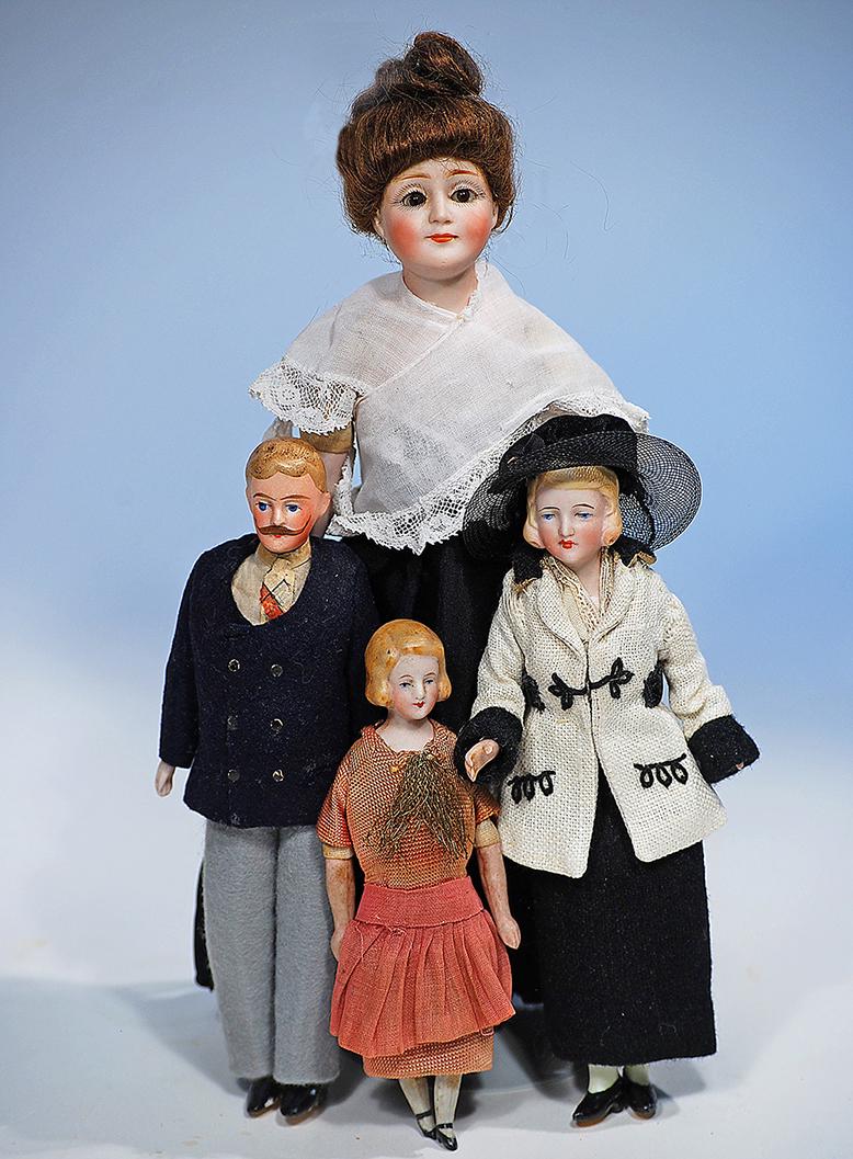 PETITE GERMAN BISQUE KESTNER "GIBSON GIRL" AND THREE: PETITE GERMAN BISQUE KESTNER "GIBSON GIRL" AND THREE ALLORIGINAL DOLLHOUSE DOLLS Gibson Girl 10", marked 172; bisque shoulderhead, dark brown sleep eyes, painted lashes, feathered brows, closed mouth,