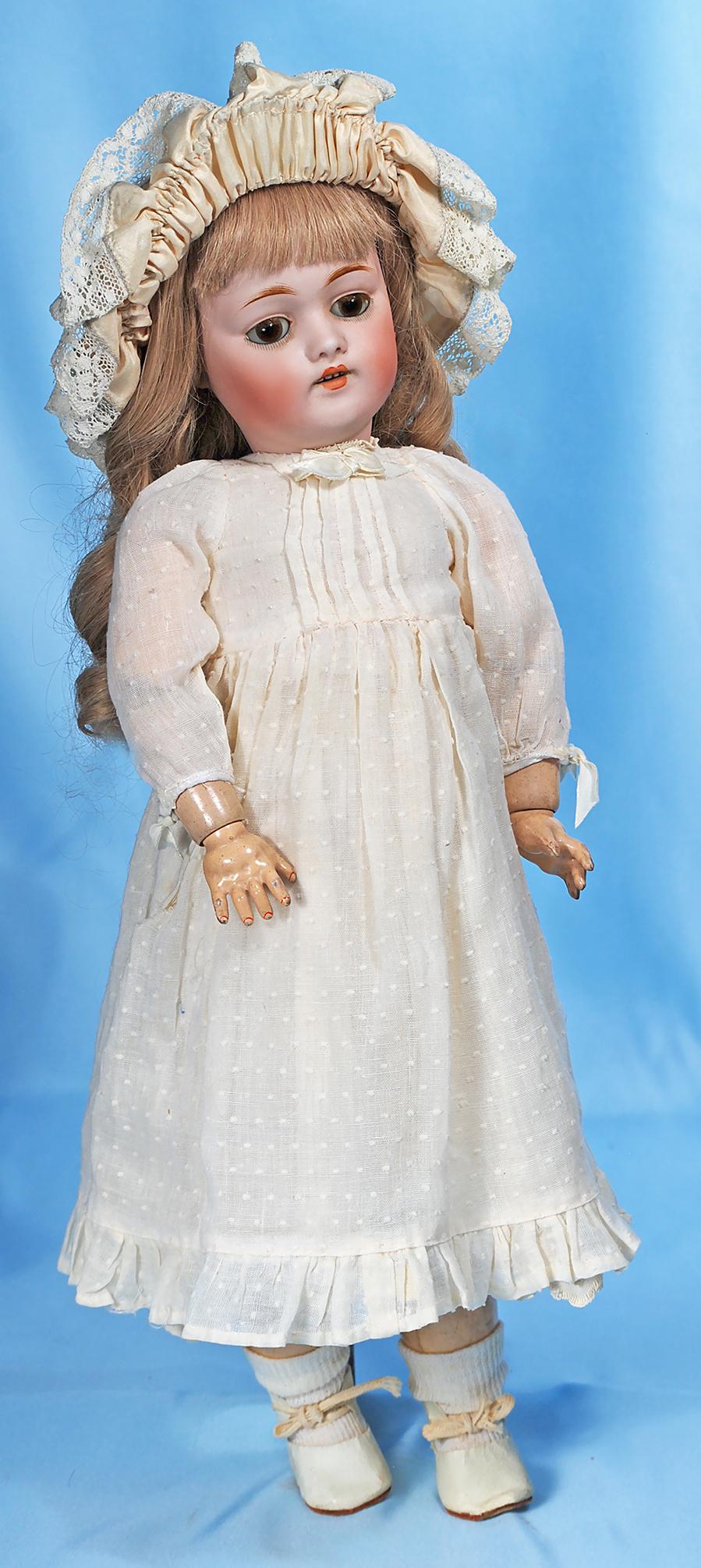 GERMAN BISQUE CHILD BY SIMON & HALBIG. Marks: made in: GERMAN BISQUE CHILD BY SIMON & HALBIG. Marks: made in Germany, D ½, 168, 8 ½. 20". Bisque socket head, brown sleep eyes, painted lower lashes, applied upper lashes, feathered brows, open mouth, squa