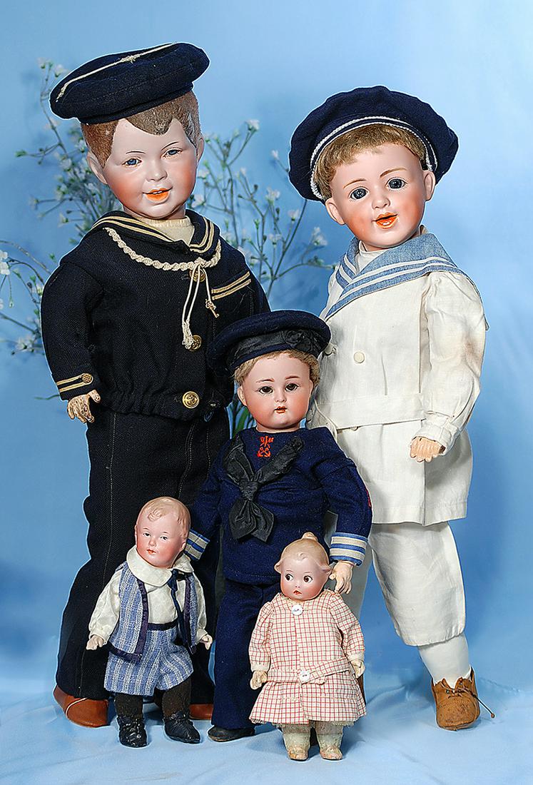 PETITE GERMAN BISQUE CHARACTER BOY, 8733, BY GEBRUDER: PETITE GERMAN BISQUE CHARACTER BOY, 8733, BY GEBRUDER HEUBACH. Marks: 8733, Huebach in square, Germany. 8". Bisque socket head, sculpted light brown hair, painted features intaglio blue eyes, upper ey