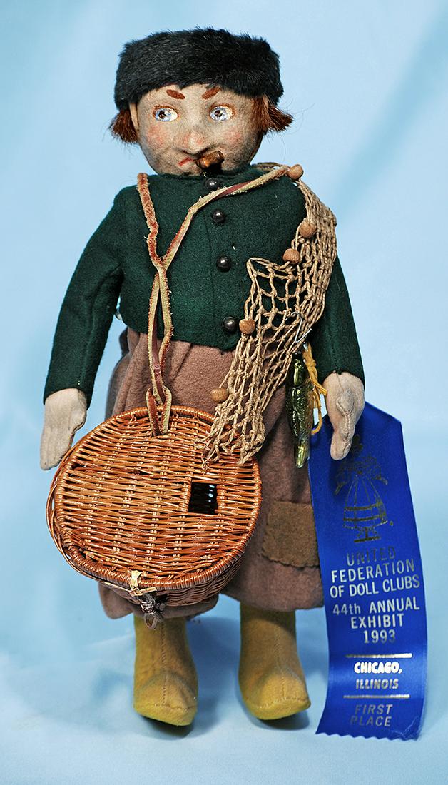 EXTREMELY RARE, EARLY FELT LENCI DOLL AS FISHERMAN.: EXTREMELY RARE, EARLY FELT LENCI DOLL AS FISHERMAN. 14". Pressed felt swivel head depicting adult man with strong portrait features including broad face and pronounced nose, plumply modeled jointed fe