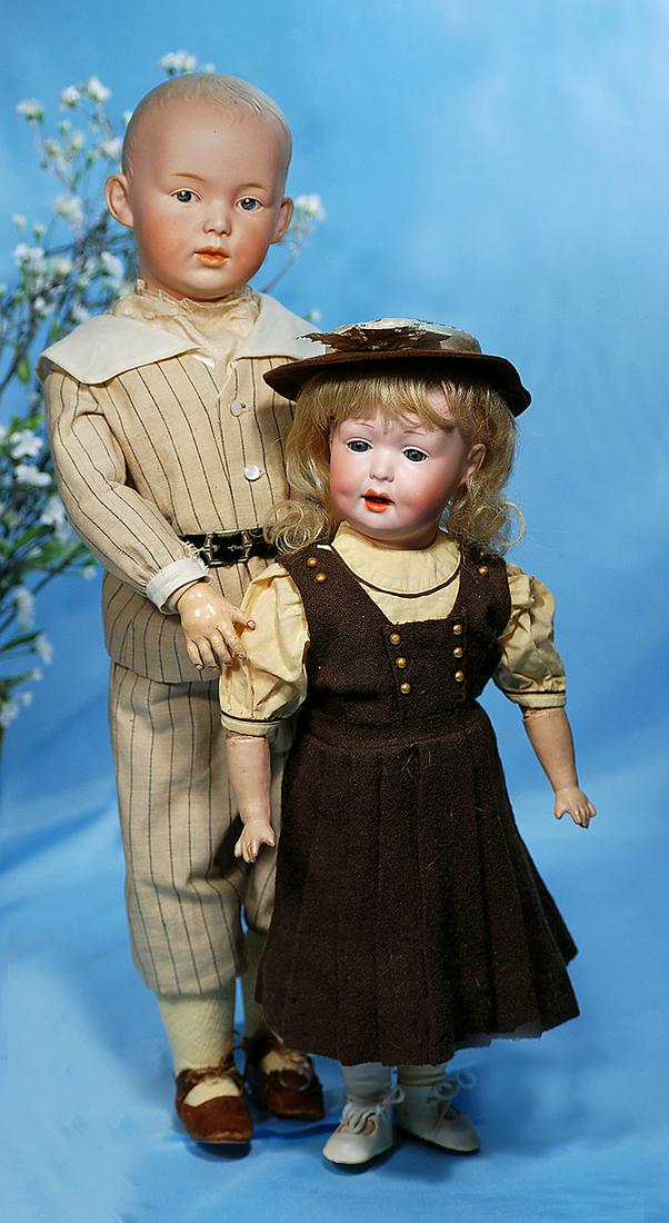 GERMAN BISQUE CHARACTER, 590, BY MARSEILLE. Marks:: GERMAN BISQUE CHARACTER, 590, BY MARSEILLE. Marks: 590 A. 3 M. Germany DRGM. 15". Bisque socket head, blue sleep eyes, painted lashes, short tapered brows, open closed mouth with modeled tongue betwee